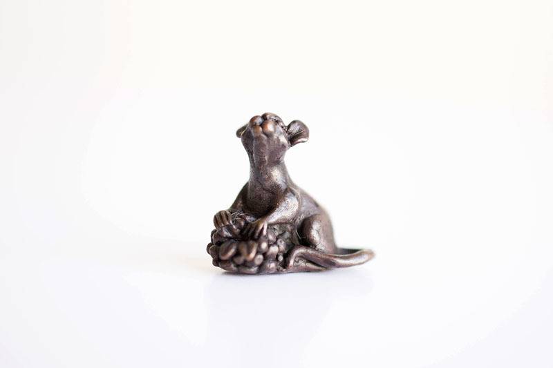 A picture of 'Miniature Bronze Mouse and Berry'