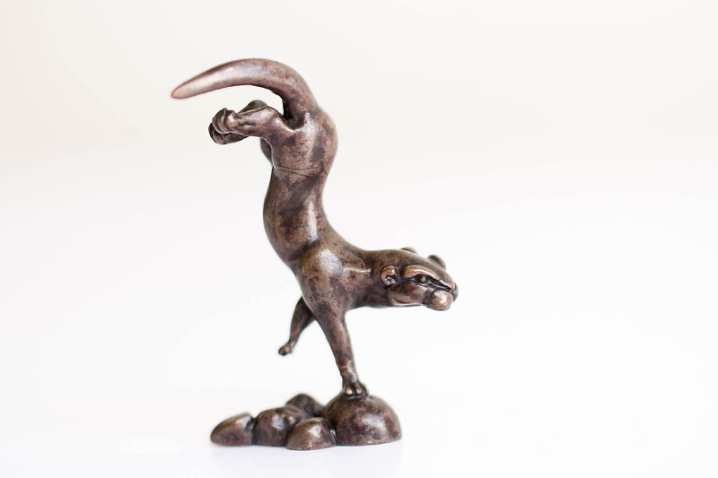A picture of 'Miniature Bronze Swimming Otter'