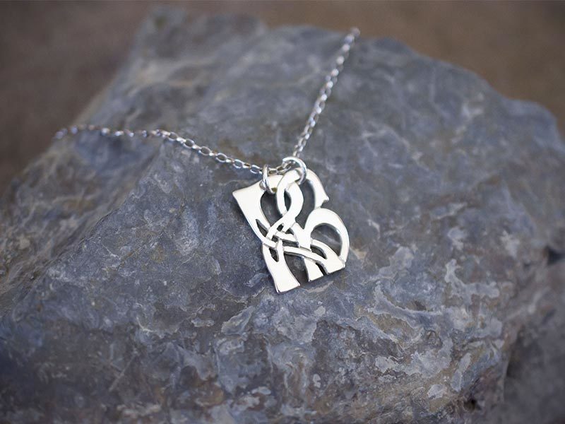 A picture of 'Silver Pendant - Initial RH'