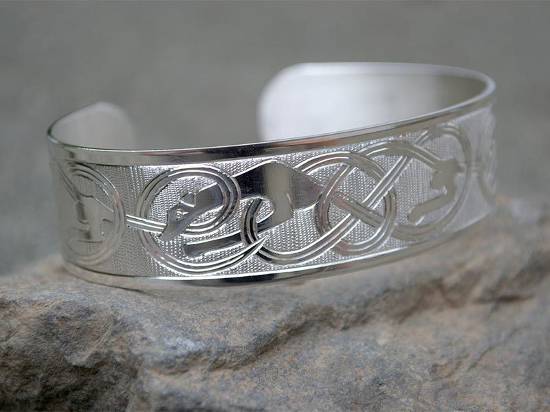 A picture of 'Silver Hounds of Annwn Bangle '