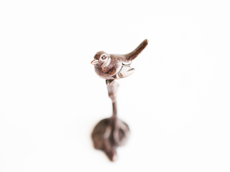 A picture of 'Miniature Bronze Robin on Twig''