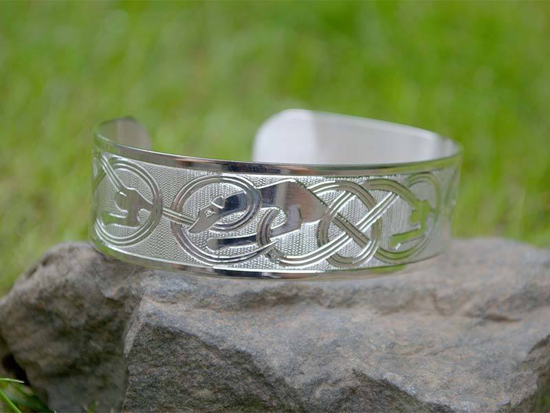 A picture of 'Silver Hounds of Annwn Bangle ''